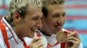 Les deux Français célébraient leurs médailles d'argent et de bronze (50 m NL) des Jeux olympiques.
