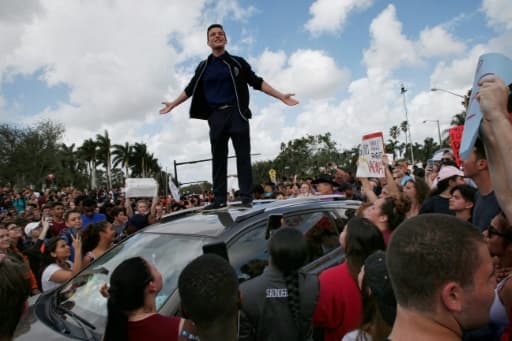 Un élève s'adresse à ses camarades lors d'une manifestation le 21 février 2018 au lycée Marjorie Stoneman Douglas en Floride