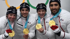 Le relais mixte médaillé d'or en biathlon