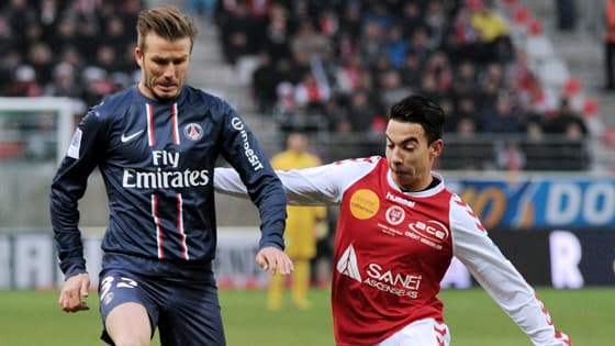 David Beckham et Diego Rigonato à Reims le 2 mars 2013.