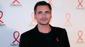 Olivier Minne à Paris le 10 mars 2014 pour le Sidaction