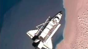 La navette américaine Discovery a quitté lundi la Station spatiale internationale (ISS) après avoir livré un nouveau module de stockage, un robot et plusieurs tonnes de fournitures à l'occasion de sa 39e et dernière mission dans l'espace. /Image TV du 7 m