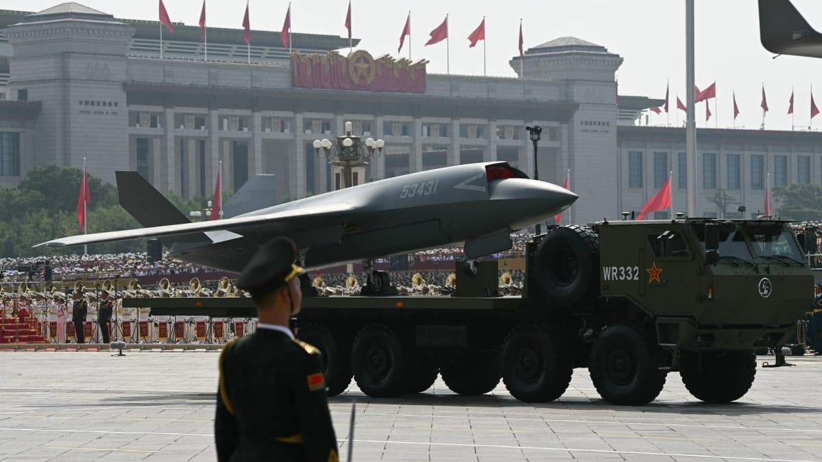 A drone is visible during a military parade that marks the 80th anniversary of the victory over Japan and the end of World War II, in the Tiananmen Square in Beijing on September 3, 2025. A drone is visible during a military parade that marks the 80th anniversary of the victory over Japan and the end of World War II, in the Tiananmen Square in Beijing on September 3, 2025.