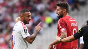 Une explication entre Corentin Tolisso et Olivier Giroud pendant un match, septembre 2025