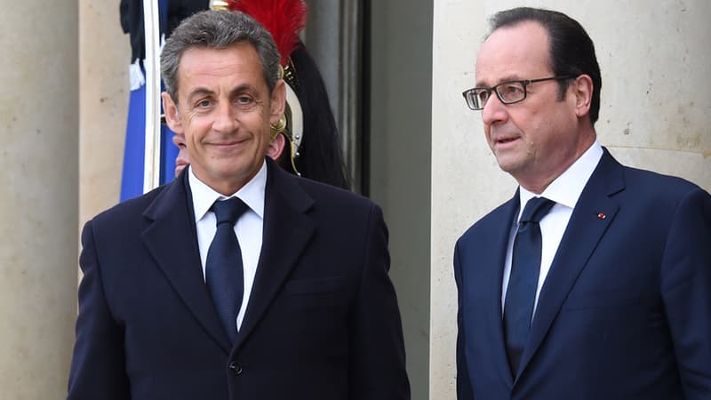 Nicolas Sarkozy et François Hollande sur le perron de l'Elysée le 11 janvier 2015.