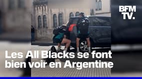 En Argentine, trois joueurs des All Blacks soulèvent la voiture d'un automobiliste coincée