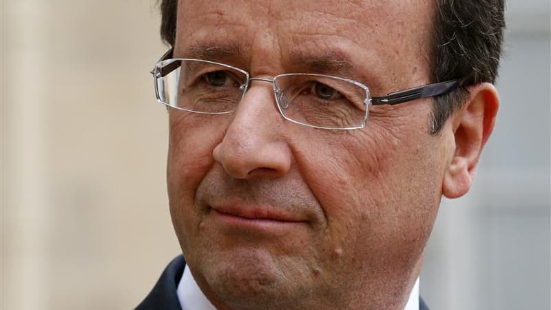 La taxe touchant les Français les plus riches sera réaménagée pour tenir compte de la censure du Conseil constitutionnel, mais l'objectif reste inchangé, a déclaré lundi François Hollande lors de ses voeux aux Français. /Phoot prise le 17 novembre 2012/RE