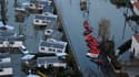 Vue aérienne de maisons inondées à La Faute-sur-mer, le 1er mars 2010. Un an après la tempête Xynthia qui avait fait 53 morts dans l'ouest de la France, le gouvernement a présenté jeudi un plan de prévention des inondations doté de 500 millions d'euros de