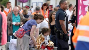 Des victimes de la catastrophe de Brétigny, juste après le déraillement du train, le 12 juillet.