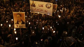 A Sanaa, au Yémen, Veillée de commémoration de Mohamed Bouazizi, dont l'immolation a inspiré les printemps arabes. Ce jeune Tunisien qui s'était donné la mort après avoir été molesté et insulté par la police en décembre 2010 a été désigné personnalité par