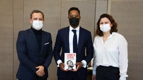 Patrice Evra, en compagnie de la ministre déléguée chargée des Sports, Roxana Maracineanu