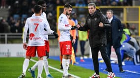 Théo Valls, Romain Philippoteaux et Bernard Blaquart, lors du match Strasbourg-Nîmes le 9 novembre 2019