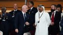 Le président de la Fifa Gianni Infantino aux côtés de Khalid bin Khalifa bin Abdulaziz Al Thani