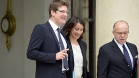 Pascal Canfin à la sortie du Conseil des ministres en présence de Cécile Duflot et Bernard Cazeneuve à l'Elysée le 19 juin 2013.