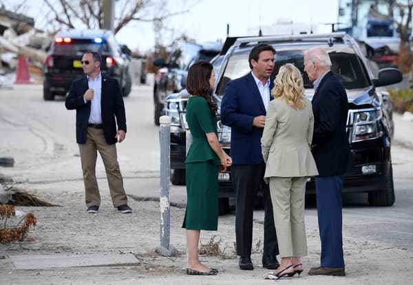 The President of the United States visits Fort Myers, a Florida city hard hit by Hurricane Ian, with his wife Jill Biden, on October 5, 2022. They are greeted by Governor Ron De Santis and his wife Casey DeSantis.