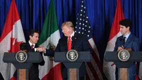 L'ancien président mexicain Enrique Pena Nieto, l'ancien président américain Donald Trump et le Premier ministre canadien Justin Trudeau lors d'une déclaration sur la signature du nouvel accord de libre-échange nord-américain, le 30 novembre 2018 en marge du sommet du G20 à Buenos Aires (Argentine).
