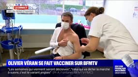 Covid-19: le ministre de la Santé Olivier Véran reçoit sa première dose de vaccin devant les caméras