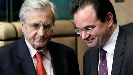 Le président de la Banque centrale européenne, Jean-Claude Trichet (à gauche), en compagnie du ministre grec des Finances George Papaconstantinou à Bruxelles. Une semaine après avoir décidé d'un plan massif de stabilisation de la zone euro, l'Eurogroupe a