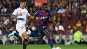 Diego Carlos face à Ousmane Dembélé