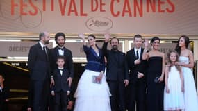 L'équipe du film "Le passé" d'Asghar Farhadi (au centre). A mi-parcours du festival de Cannes, l'oeuvre du cinéaste iranien et deux autres films, "A Touch of Sin", du Chinois Jia Zhang-ke, et "Inside Llewyn Davis", des frères Joel et Ethan Coen, semblent