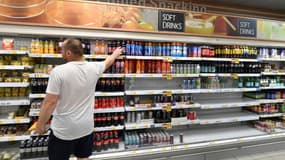 Des étagères vides dans un supermarché Tesco à Londres le 22 juillet 2021