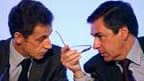 Les cotes de confiance de Nicolas Sarkozy et François Fillon restent proches de leur niveau le plus bas dans le baromètre TNS Sofres pour Le Figaro Magazine. /Photo d'archives/REUTERS/Charles Platiau