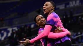 Abdou Diallo et Kylian Mbappé lors d'OL-PSG, le 21 mars 2021.