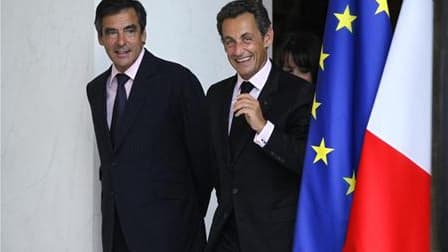 François Fillon déclare assumer ses "différences" avec Nicolas Sarkozy et condamne les déclarations de certains membres de la majorité ou de ministres qui font de la "surenchère" sur la sécurité. /Photo prise le 26 août 2010/REUTERS/Charles Platiau