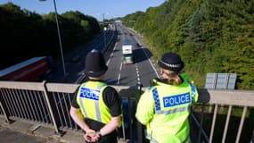 Des policiers surveillent l'autoroute M4, à Newport, dans le sud du pays de Galles, le 2 septembre 2014. (image d'illustration)