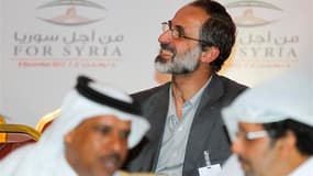 Le cheikh Moaz Al Khatib élu dimanche à Doha à la tête de la nouvelle "coalition nationale" syrienne qui réunit l'ensemble des composantes de l'opposition au président syrien Bachar al Assad. La France a salué l'accord conclu à Doha. /Photo prise le 11 no