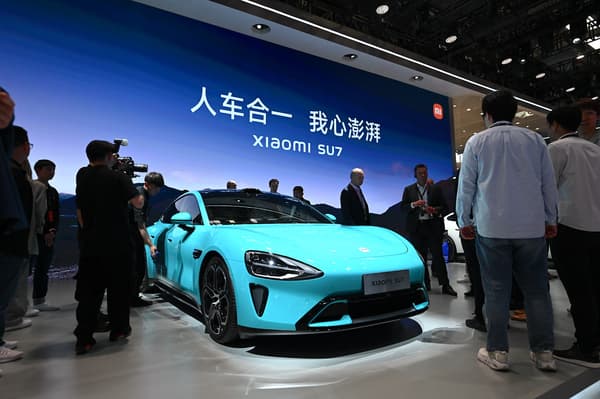 A Xiaomi SU7 electric car is unveiled at the Beijing Auto Show on April 25, 2024.