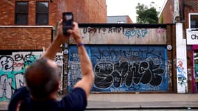 Un bâtiment situé à Rye Lane, dans le sud-ouest de Londres, sur lequel l'artiste Banksy avait peint une œuvre avant qu'elle ne soit enlevée par deux hommes cagoulés, le 8 août 2024.