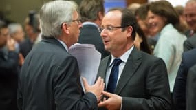 Hollande et Juncker, ici en 2013, vont devoir trouver un terrain d'entente sur le déficit de la France.