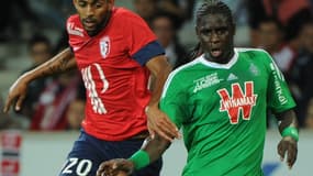 Moustapha Bayal Sall à la lutte avec Ronny Rodelin