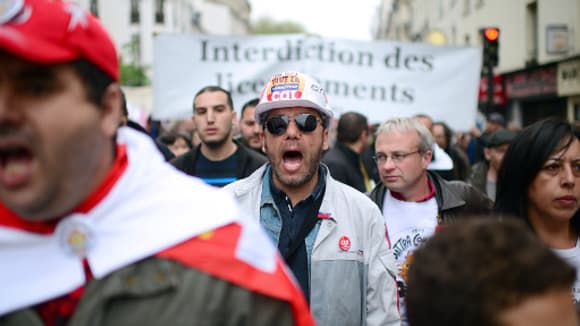 Des syndicalistes lors du défilé du 1er mai 2013 à Paris. Des syndicalistes lors du défilé du 1er mai 2013 à Paris.