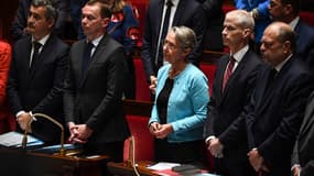 Gérald Darmanin, Olivier Dussopt, Élisabeth Borne et Éruc Dupont-Moretti à l'Assemblée nationale le 23 mai 2023 pendant l'hommage à l'infirmière tuée au CHU de Reims 