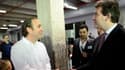 En juin 2013, à l'assemblée annuelle de l'Electronic Business Group, poignée de main entre Arnaud Montebourg et Xavier Niel.