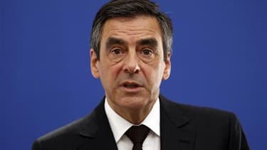 Le Premier ministre François Fillon estime que le temps du laxisme budgétaire est révolu en France, car la dette menace la souveraineté politique, économique et sociale de la France. /Photo prise le 22 juillet 2011/REUTERS/Eric Gaillard