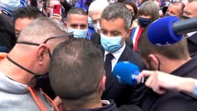 Le ministre de l'Intérieur, Gérald Darmanin, arrive à la manifestation des policiers devant l'Assemblée nationale, le 19 mai 2021.