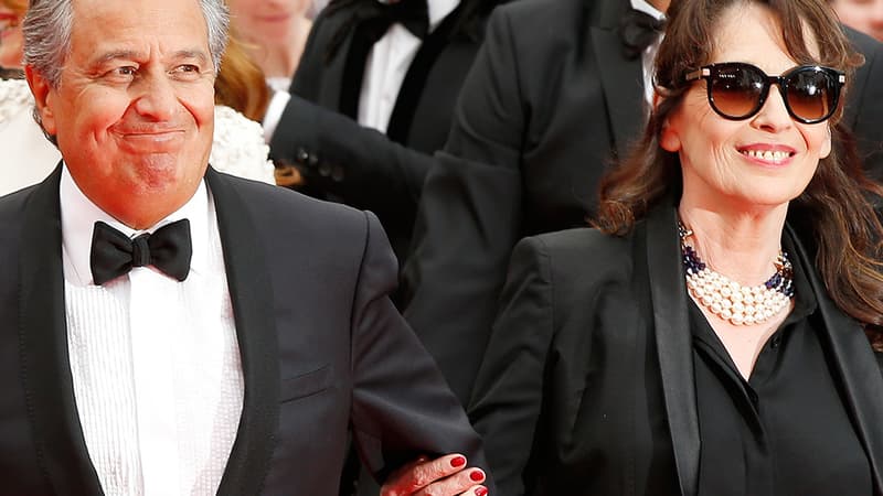 Christian Clavier et Chantal Lauby, acteurs de "Qu'est-ce qu'on a fait au Bon Dieu", à Cannes en mai 2014.