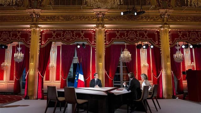 Nicolas Sarkozy a quasiment levé dimanche les derniers doutes qui pesaient sur sa candidature à l'élection présidentielle du printemps en déclarant qu'il ne se déroberait pas à son "rendez-vous avec les Français", lors de son intervention télévisée. /Phot
