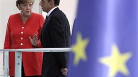 La question des Eurobonds ne figurera pas au programme de la rencontre entre Angela Merkel et Nicolas Sarkozy mardi à Paris. /Photo prise le 17 juin 2011/REUTERS/Fabrizio Bensch