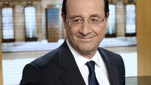 François Hollande met les électeurs de gauche en garde contre la dispersion des voix au premier tour de l'élection présidentielle, qui risque selon lui de bénéficier à un Nicolas Sarkozy dont le camp est selon lui uni et combatif. /Photo prise le 27 févri