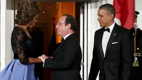 Michelle Obama accueille François Hollande avant le dîner d'Etat dans les jardins de la Maison Blanche.