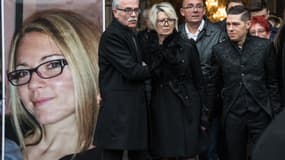 Les parents et l'époux d'Alexia Daval lors des obsèques de la jeune femme, le 8 novembre 2017.