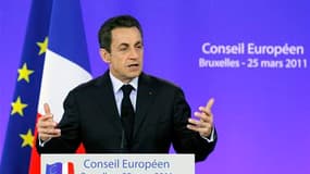 Nicolas Sarkozy à Bruxelles. La France et ses principaux partenaires de la coalition engagée en Libye s'efforcent d'ouvrir des perspectives d'issue politique à la crise libyenne pour préserver un consensus à la merci de la moindre bavure. /Photo prise le