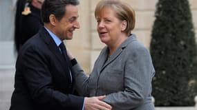 Selon Nicolas Sarkozy, si Angela Merkel vient en France avant l'élection présidentielle, ce sera pour parler Europe et non pour participer à une réunion électorale de l'UMP. /Photo prise le 6 février 2012/REUTERS/Philippe Wojazer