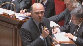 Lors des questions au gouvernement, Pierre Moscovici a accusé à mots couverts Jean-François Copé de cumuler son activité de député avec celle d'avocat d'affaire.