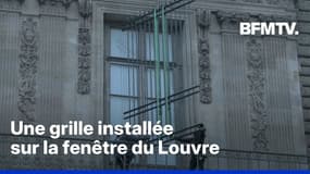 Une grille installée sur la fenêtre du Louvre par laquelle sont passés les voleurs
