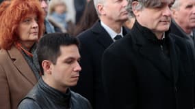 Simon Fieschi (g) et Riss (d) lors d'une cérémonie en hommage aux victimes de l'attentat de Charlie Hebdo, à Paris, le 7 janvier 2023